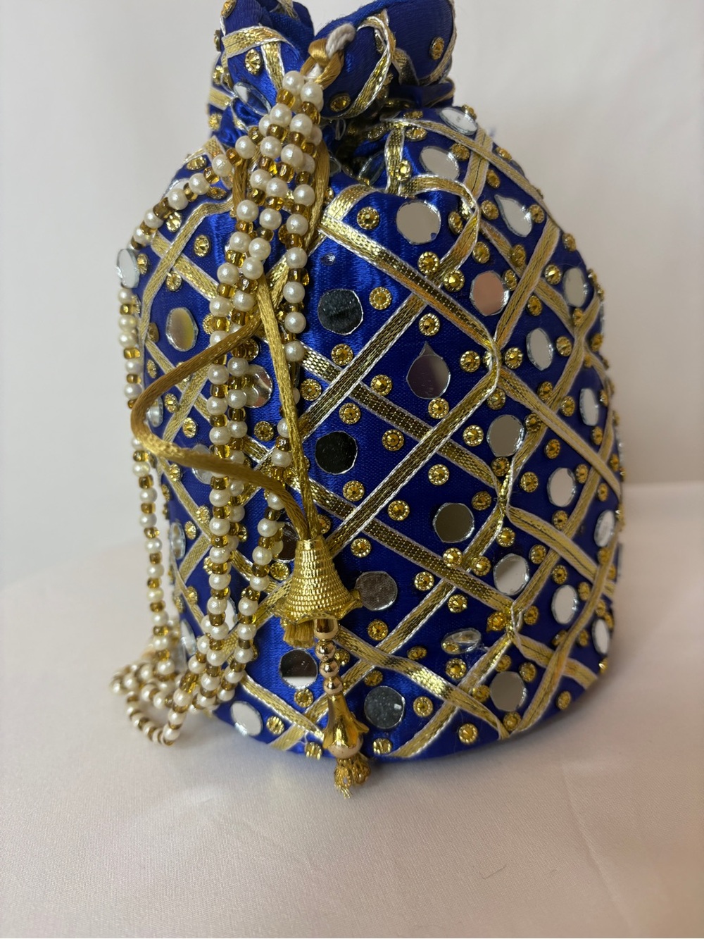 Embellished Royal Blue Potli Bag with Gold Mirror Work